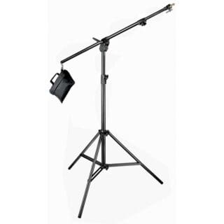 A black photography boom stand with an adjustable arm, tripod base, and a counterweight bag attached, used for mounting lights or other equipment.