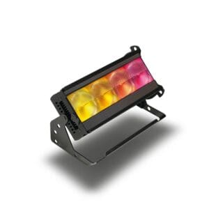 A black LED stage light fixture with multiple colored bulbs emitting yellow and pink light, mounted on an adjustable bracket and casting a shadow on a white surface.