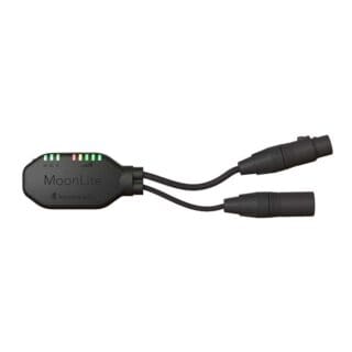 A black MoonLite device by LumenRadio with indicator lights and two attached cables ending in connector plugs, designed for professional lighting or video setups, placed on a white background.